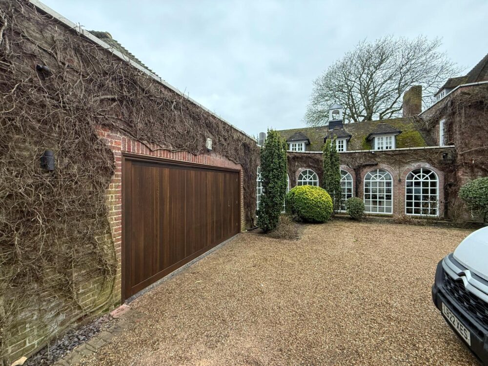 Timber Garage Door With Pedestrian Access 1