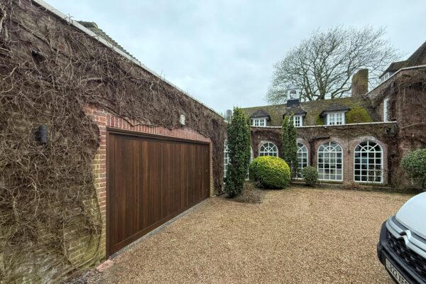 Timber Garage Door With Pedestrian Access