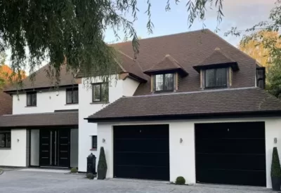 Twin garage doors installed on detached property
